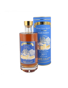 Bouteille de rhum vieux 11 ans 2011, illustration bleu et doré, avec boîte cylindrical, étiquette et bouchon doré, produit Parie