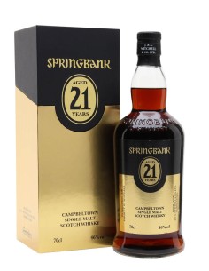 Whisky Springbank 21 ans en flacon de 70 cl accompagné de sa boîte noire et dorée, étiquette "Aged 21 Years" et bouchon noir.