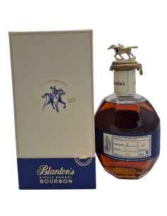 Botté de Blanton's Bourbon en flacon avec bouchon en cheval doré, près d’un emballage élégant Limited Edition 25 ans. Bourbon 70